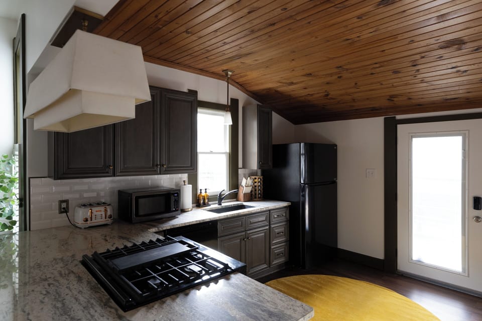 Fully equipped kitchen with spacious island for cooking & gathering