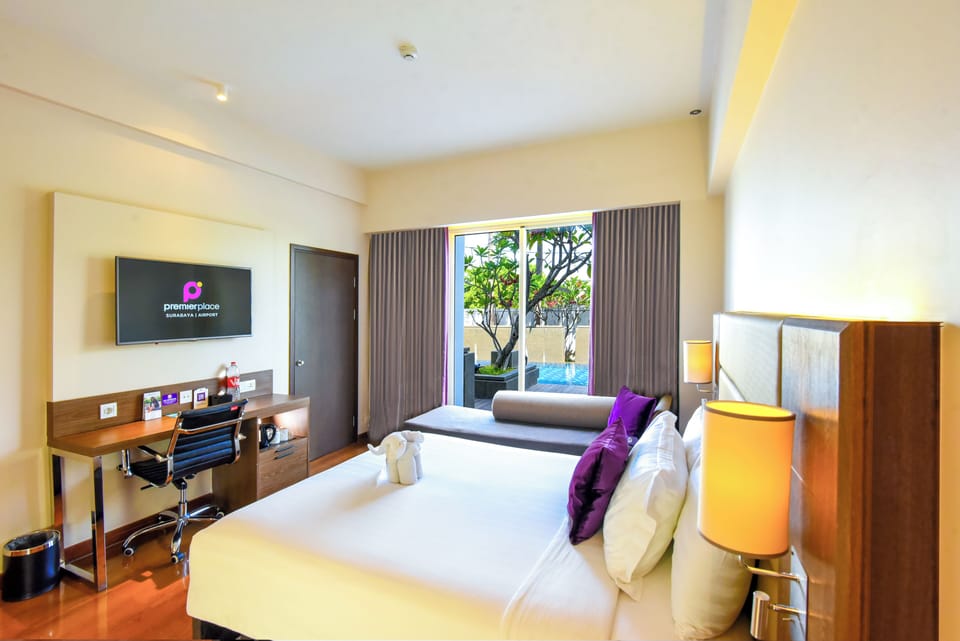 Queen Premier, Large Room, Pool Access | In-room safe, desk, blackout drapes, soundproofing