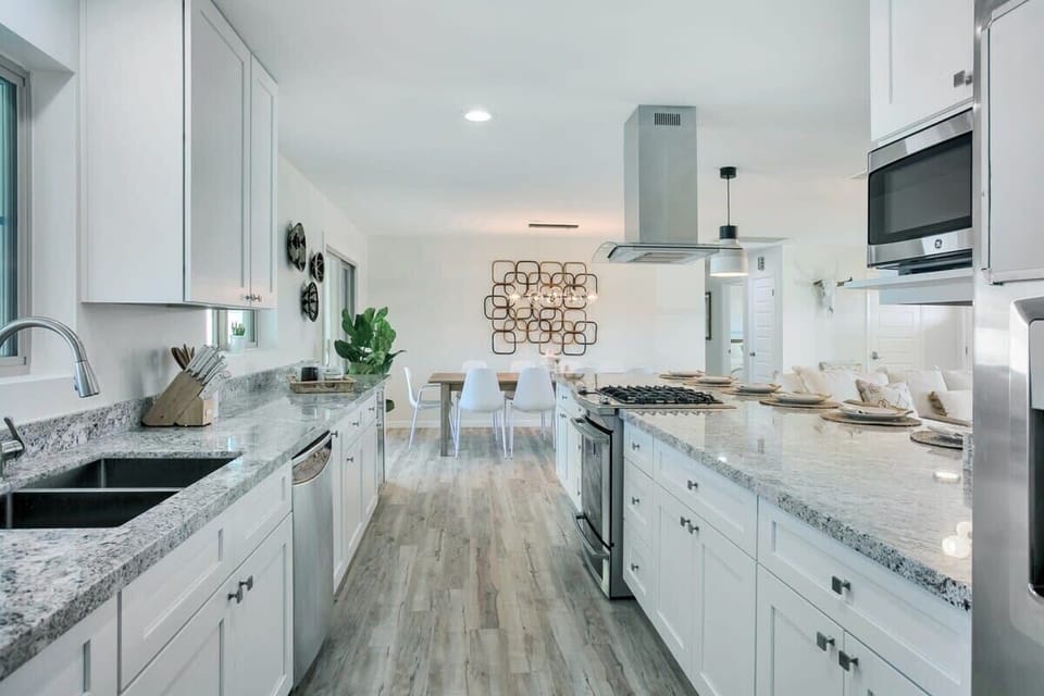 Open Concept Chef's Kitchen | Fully Stocked | Open to Dining | First Floor
