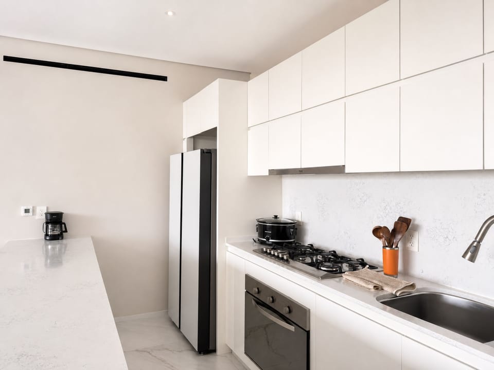 Luxury Condo, 3 Bedrooms, Balcony | Private kitchen | Fridge, oven, stovetop, dishwasher