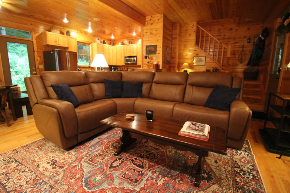 Wrap around reclining leather sofa w heat & massage