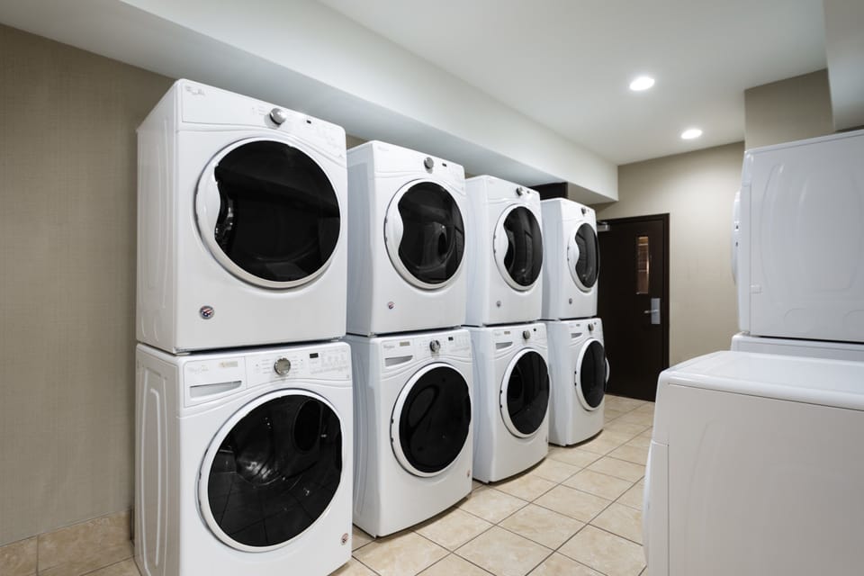 Free self-service laundry on-site with front-loading washers and dryers - open 24 hours