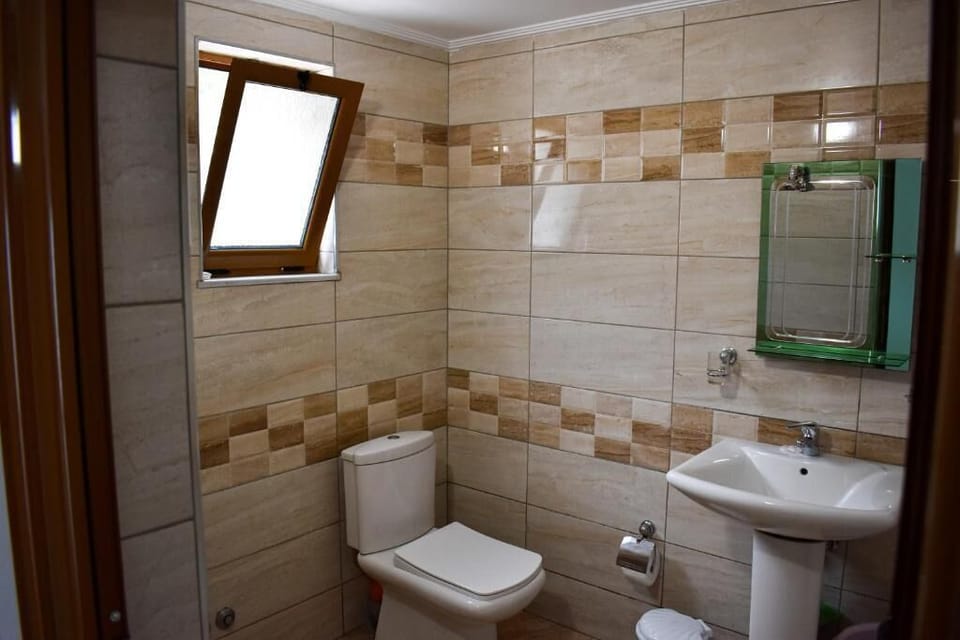Shower, hair dryer, towels, shampoo