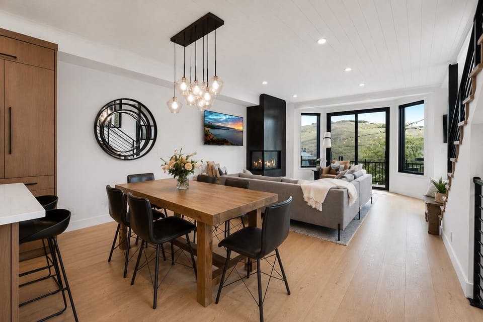 Dining/Living area with fireplace - opens to front deck with great views!