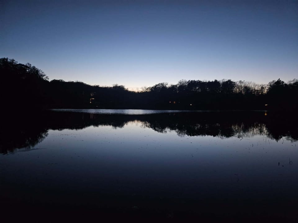 Peaceful private lake at dusk. Maybe you'll see the northern lights.