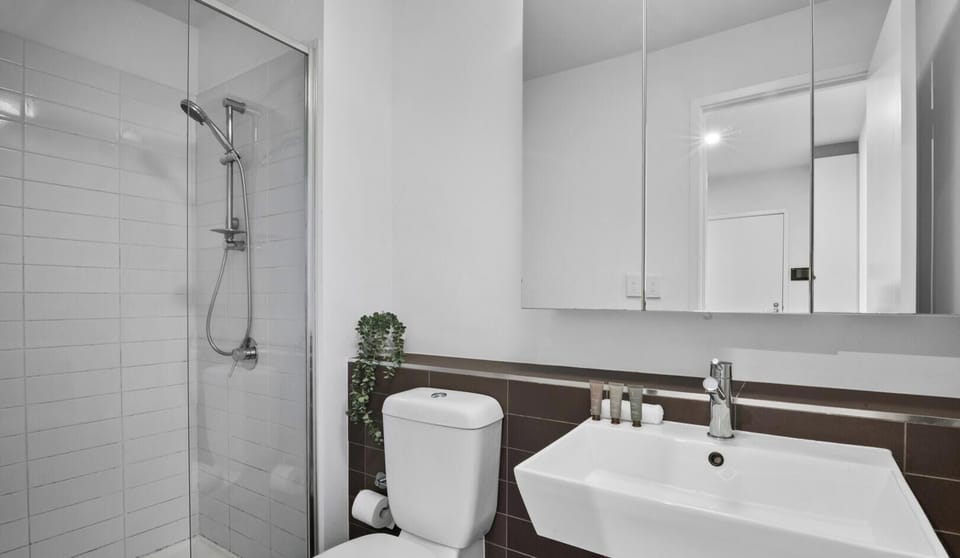 Fresh and tidy bathroom with shower facilities