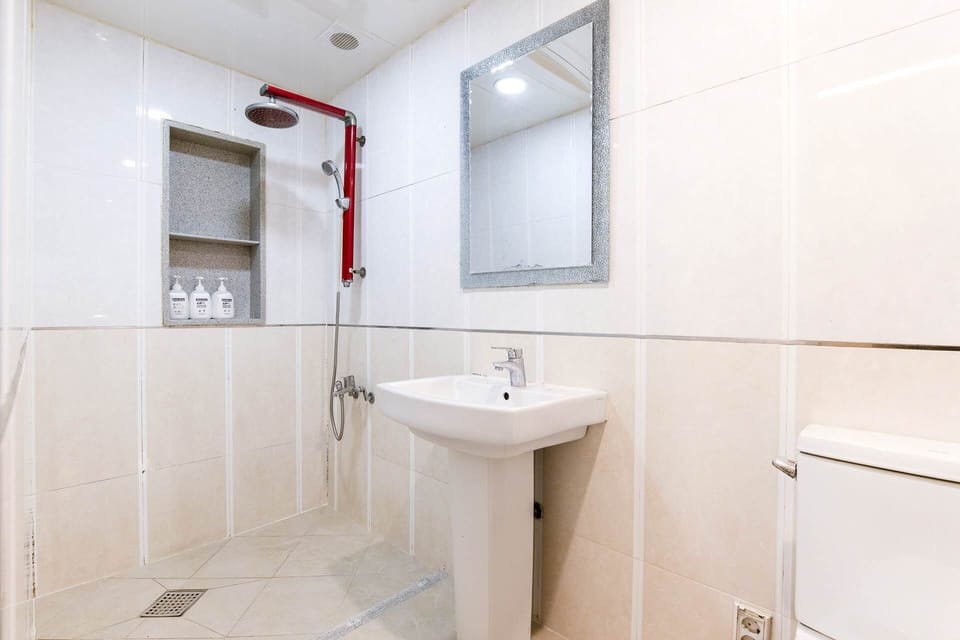 Standard Double Room, City View | Bathroom | Hair dryer, heated floors (bathroom), towels, soap