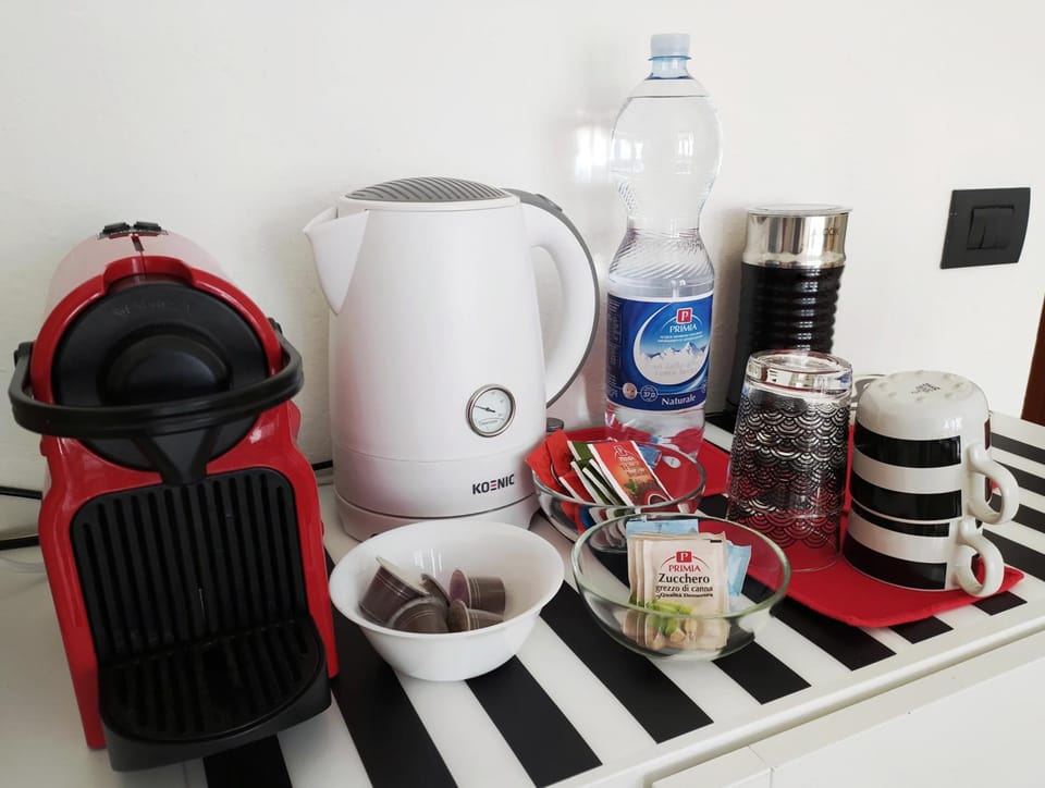 Full-size fridge, microwave, espresso maker, coffee/tea maker