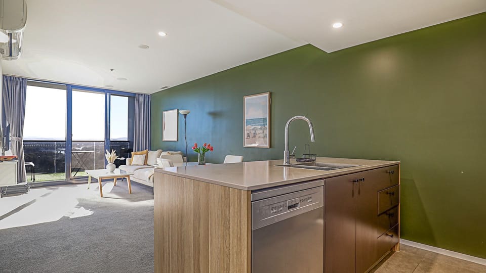 Spacious living and dining area filled with natural light.