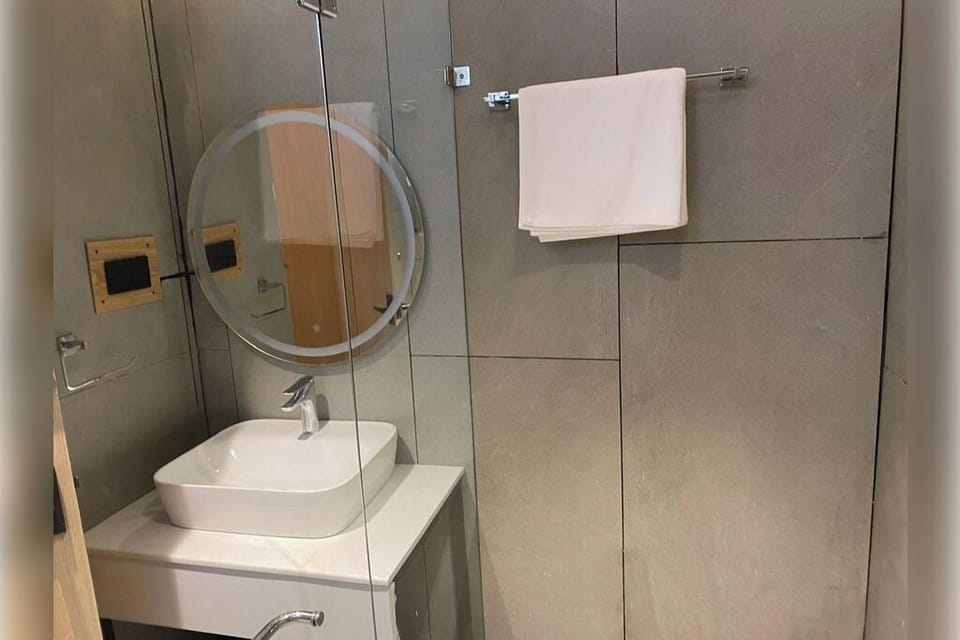 Shower, towels, soap, shampoo