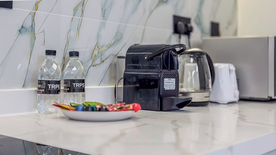 Deluxe Apartment, Balcony, Marina View | Coffee and/or coffee maker