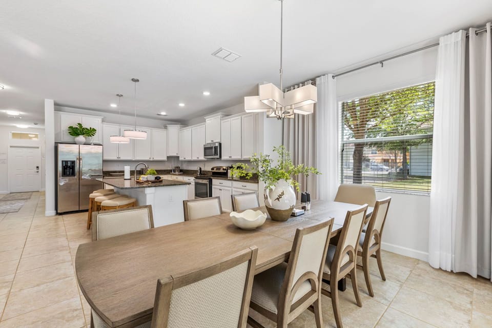 Expansive dining room overlooking the gourmet kitchen.