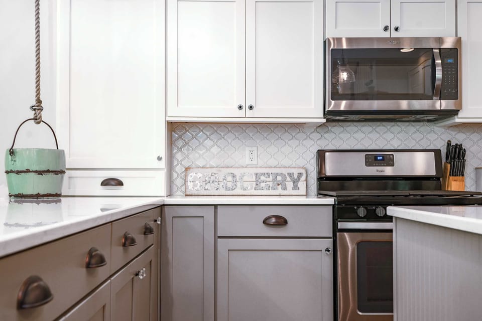 The main-level full bath offers a single vanity & shower​