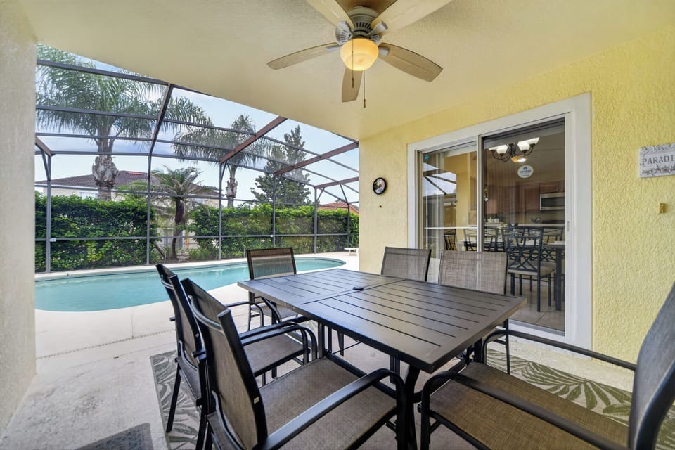 Enjoy easy alfresco meals on the covered patio, with seating for the group and a ceiling fan for added comfort.
