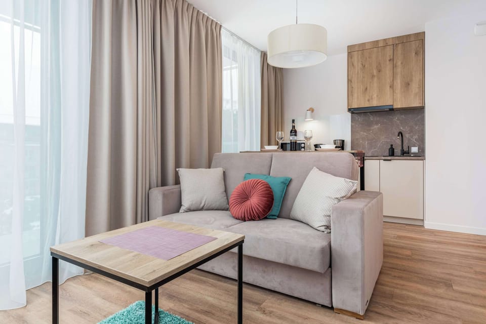 Enjoy your favorite shows on the flat-screen television in the elegant living area.