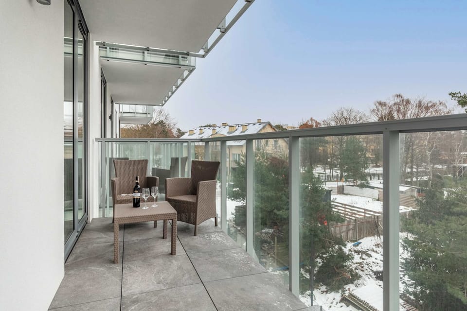 The balcony's peaceful ambiance is ideal for unwinding. 