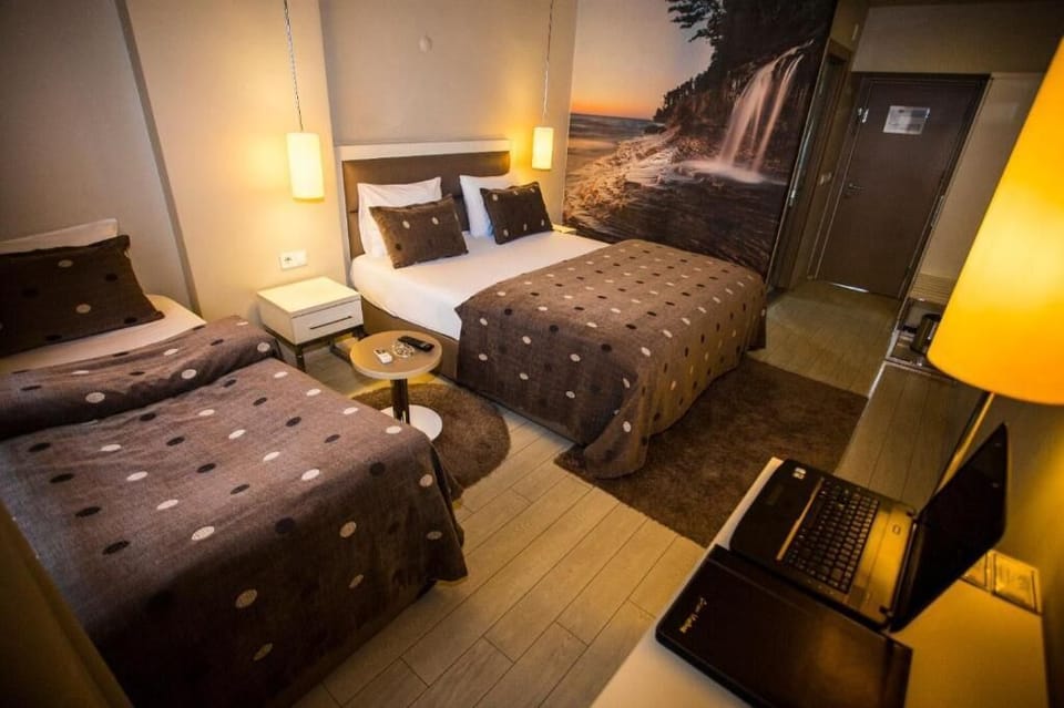Family Twin Room, Pets Allowed, City View | Minibar (free items), desk, WiFi (free), bed sheets
