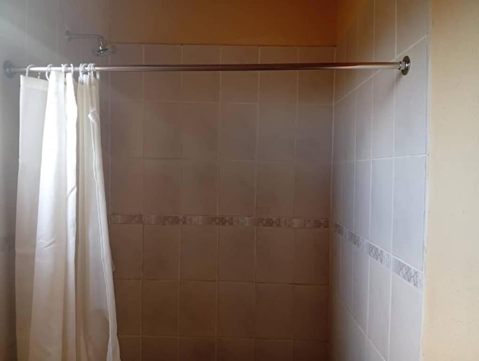 Basic Double Room | Bathroom | Shower, free toiletries, towels, soap