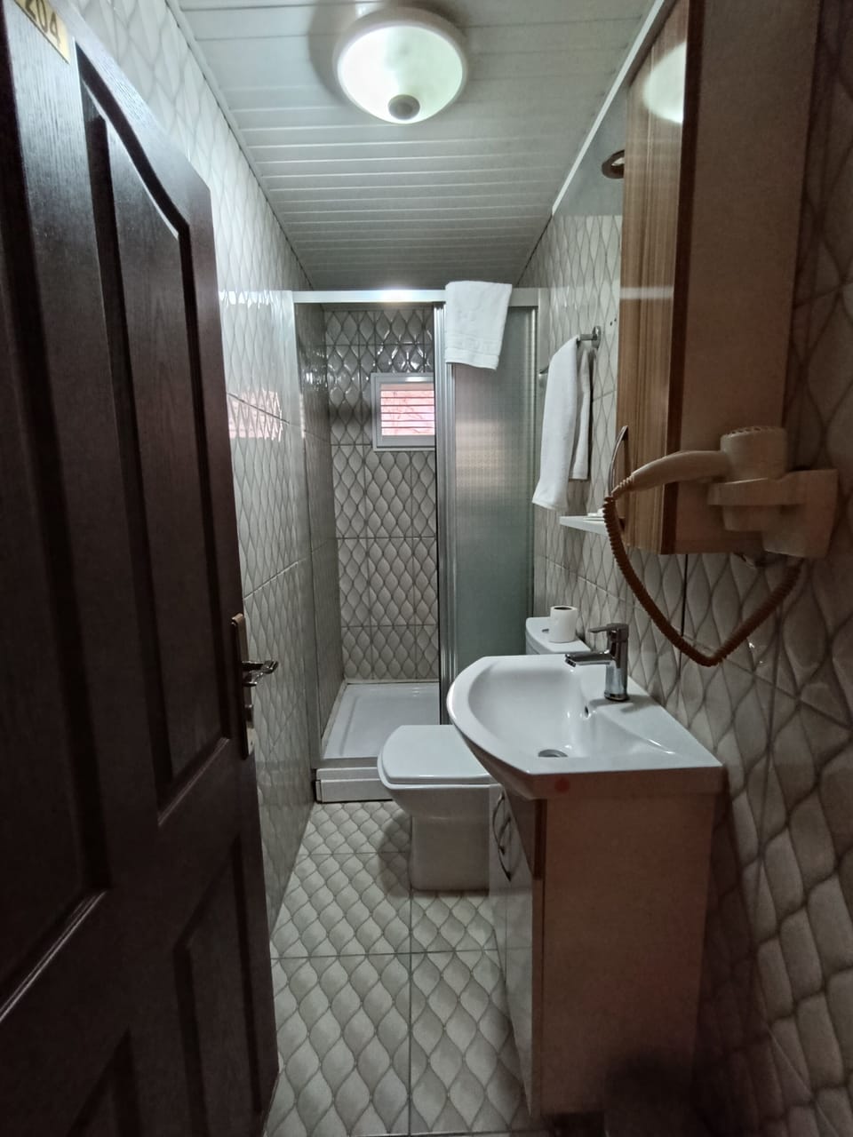Standard Double Room, 1 Double Bed, Smoking | Bathroom | Hair dryer, slippers, soap, shampoo