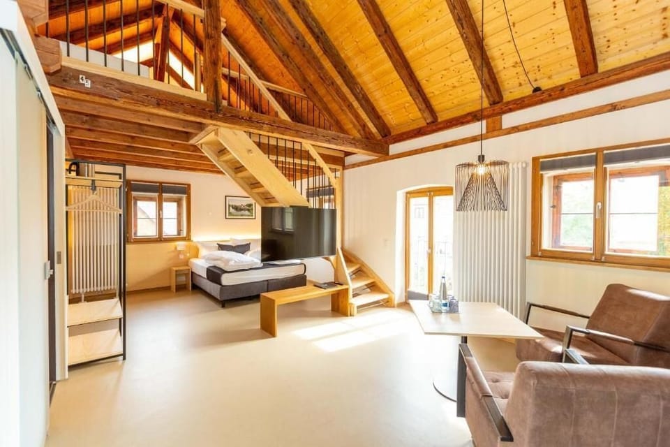Family Room, Private Bathroom | Living area | 43-inch flat-screen TV with satellite channels, heated floors