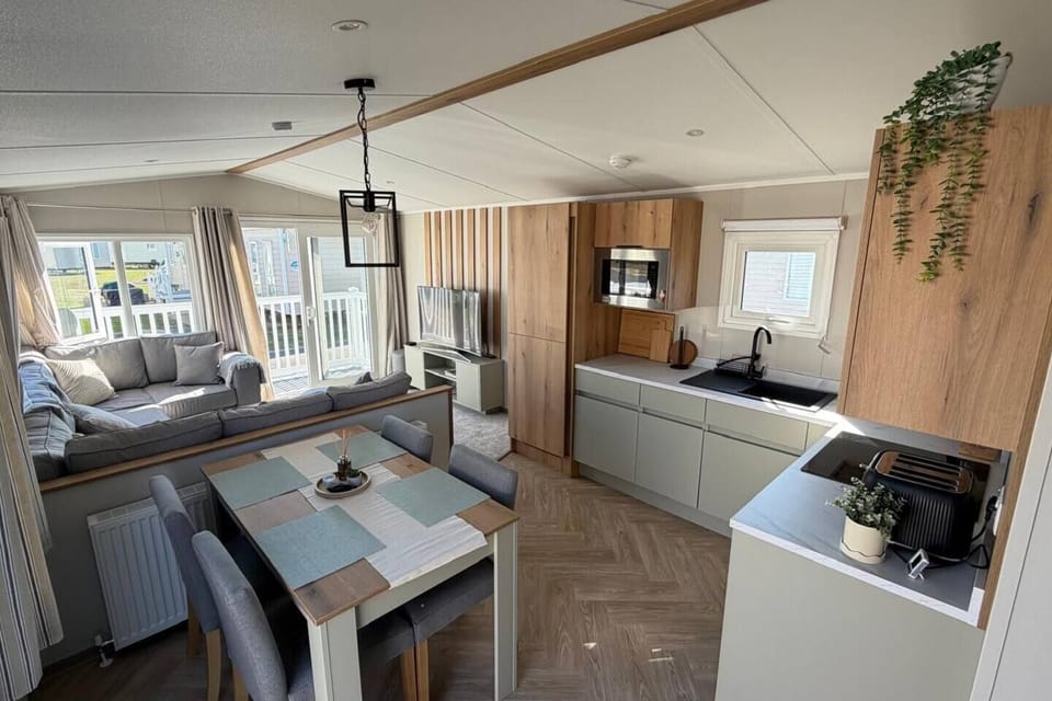 Enjoy cooking, dining and relaxing together in this bright and welcoming living space.