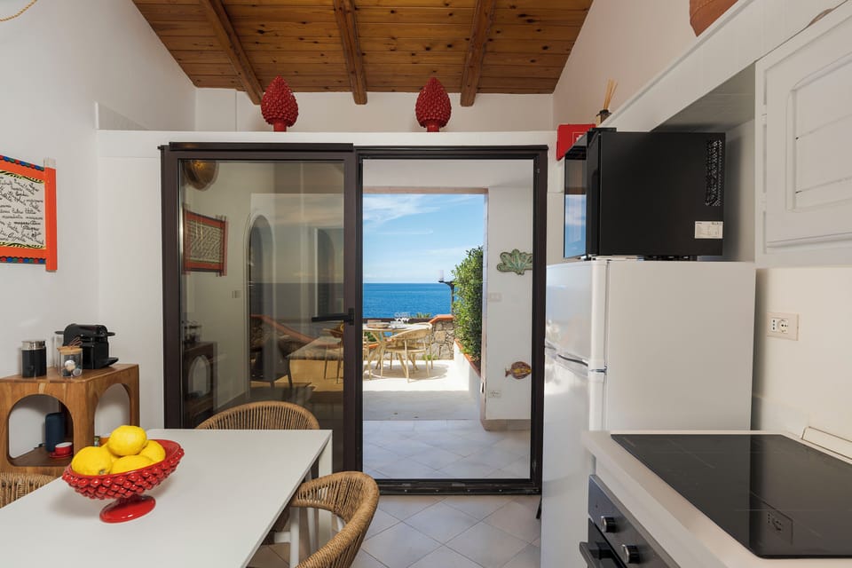 Suite, Sea Facing | Private kitchen | Espresso maker, fridge, electric kettle, toaster