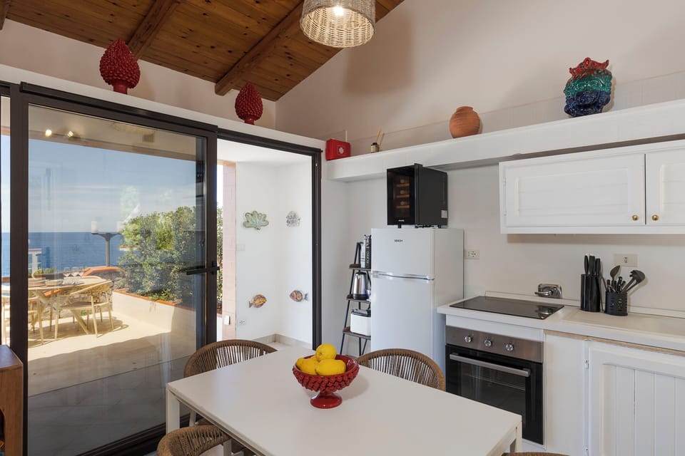 Suite, Sea Facing | Private kitchen | Espresso maker, fridge, electric kettle, toaster