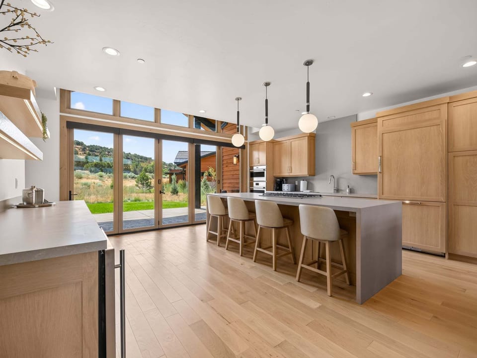 Prepare memorable meals in the gourmet kitchen, complete with luxury appliances