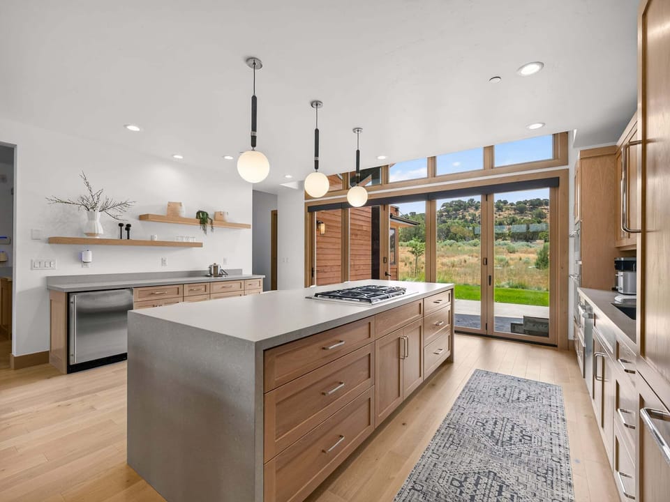 Prepare memorable meals in the gourmet kitchen, complete with luxury appliances