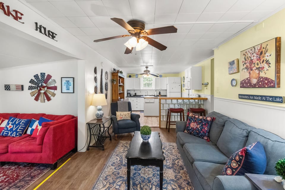 Relax in the welcoming living room with comfortable seating, a television and access to the bedrooms.