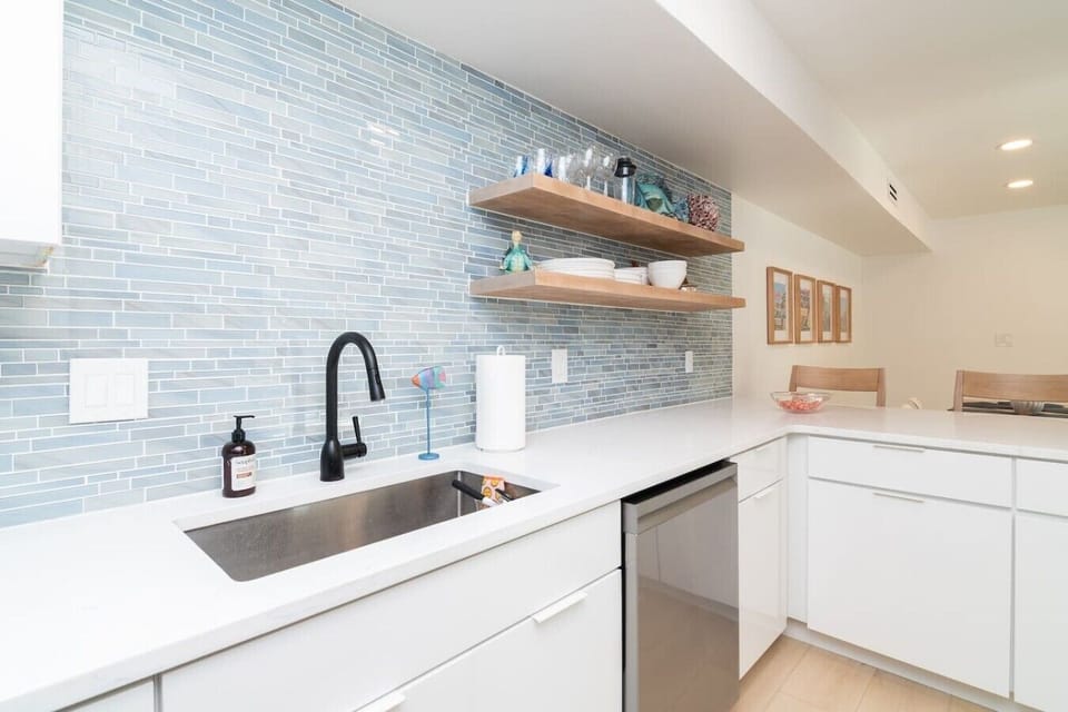 Cook with ease in the spacious kitchen featuring modern appliances and ample counter space.