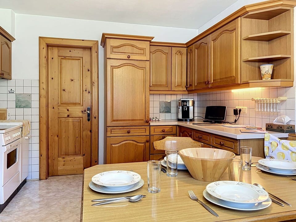Cabinetry, Furniture, Kitchen, Interior Design, Flooring, Countertop, Wood, Kitchen Appliance, Floor, Cupboard
