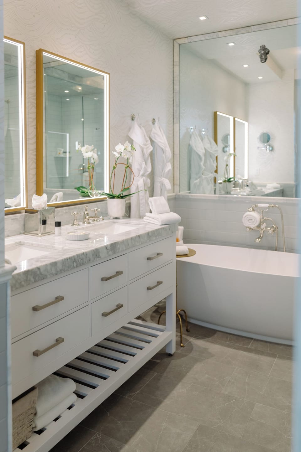 Designer toiletries, hair dryer, bathrobes, towels