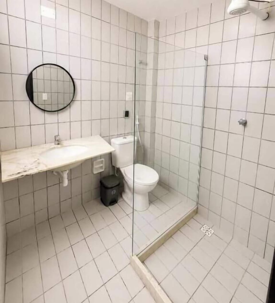 Shower, towels, toilet paper