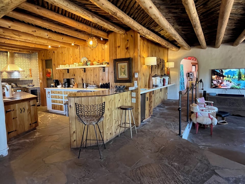 Beautifully appointed kitchen and bar areas just next to the living area and dining area.
