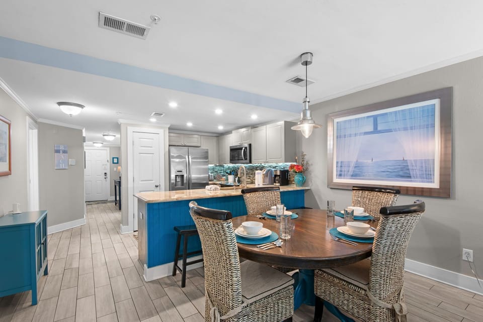 Plenty of dining room seating and a modern kitchen invite you to whip up meals together.