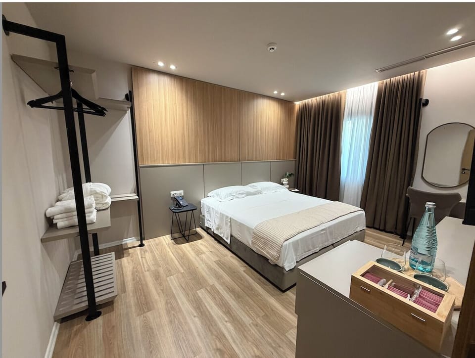 Deluxe Double Room, Mountain View | Desk, laptop workspace, blackout drapes, iron/ironing board
