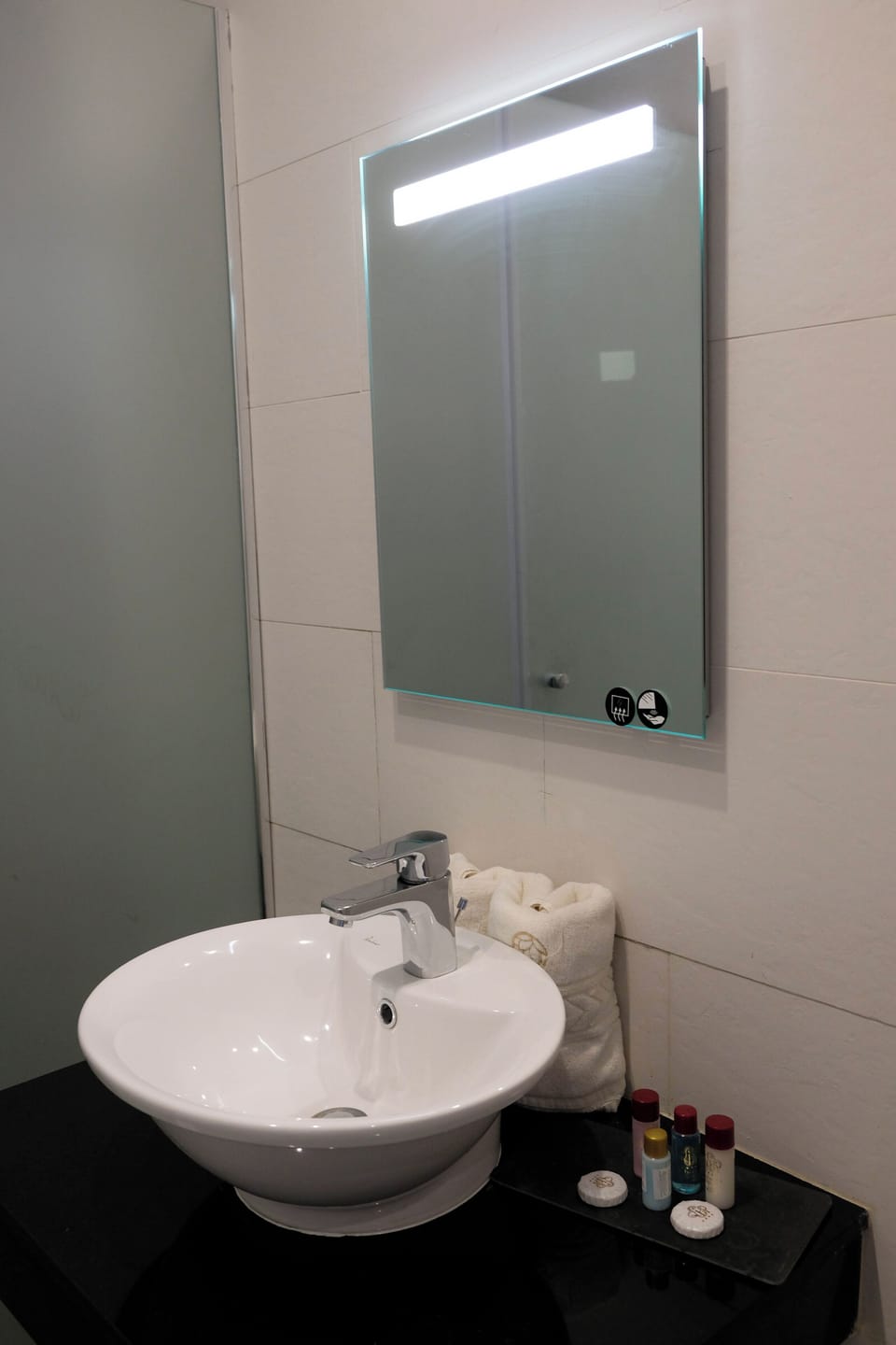 Hair dryer, towels, soap, shampoo