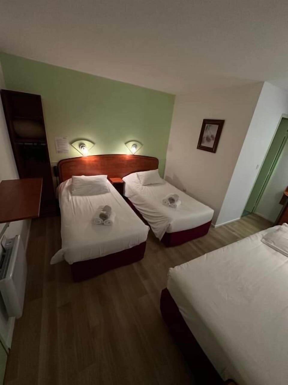 Family Triple Room | Desk, blackout drapes, iron/ironing board (on request), WiFi (free)
