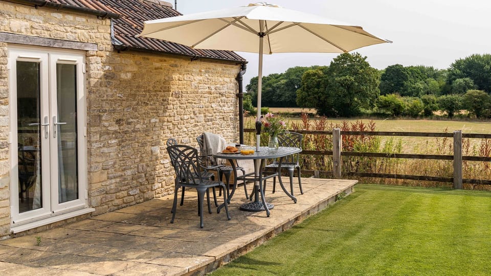 Enjoy dining al-fresco overlooking the fields.