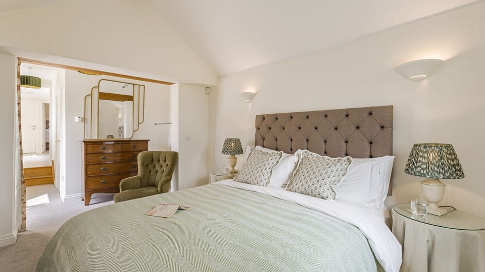 The master bedroom is tastefully furnished with an air of elegance.