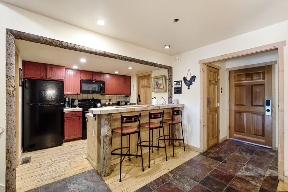 High top seating at the kitchen counter for easy, casual dining