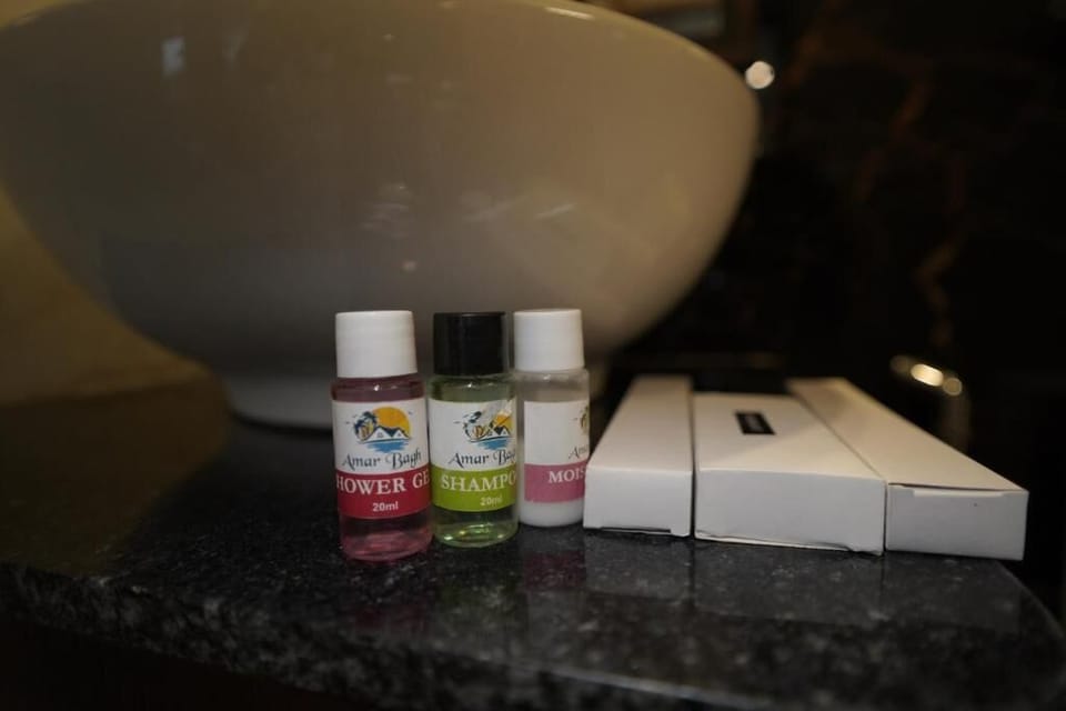 Executive Double Room, Balcony, Garden View | Bathroom amenities | Free toiletries, hair dryer (on request), towels, soap
