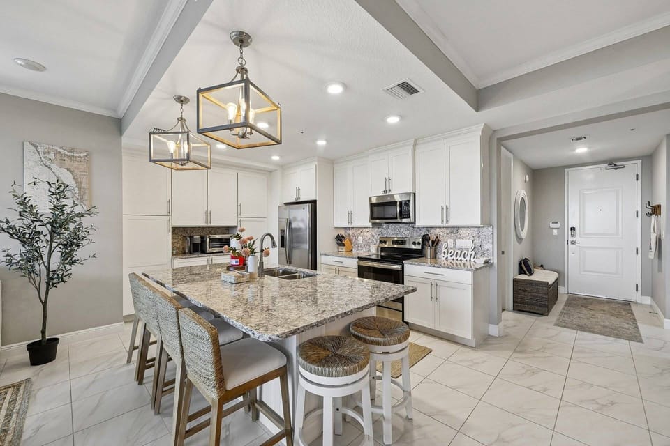 Spacious chef’s kitchen with oversized island seating