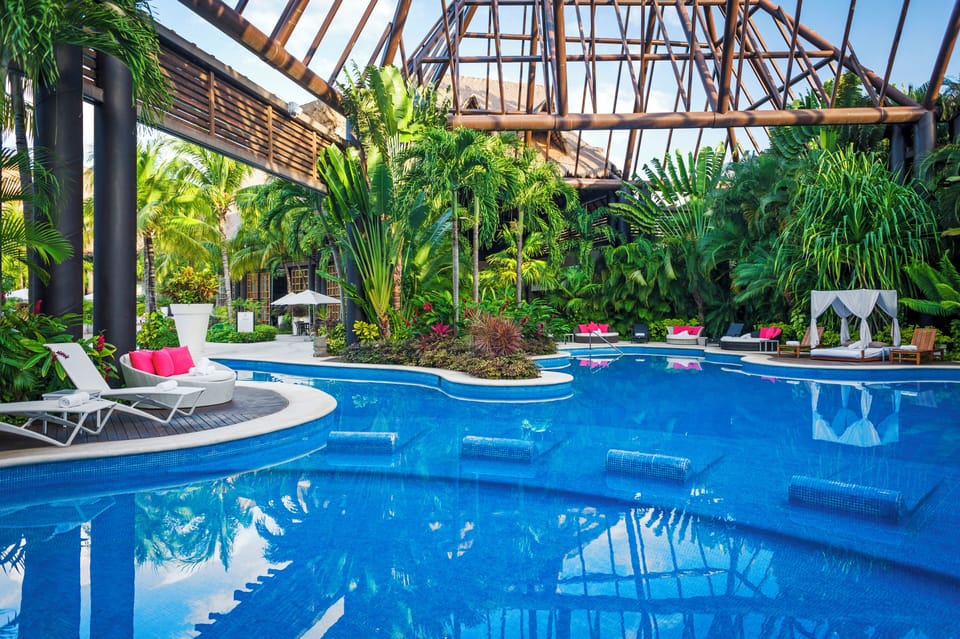 2 outdoor pools, open 7:00 AM to 7:00 PM, pool umbrellas, sun loungers