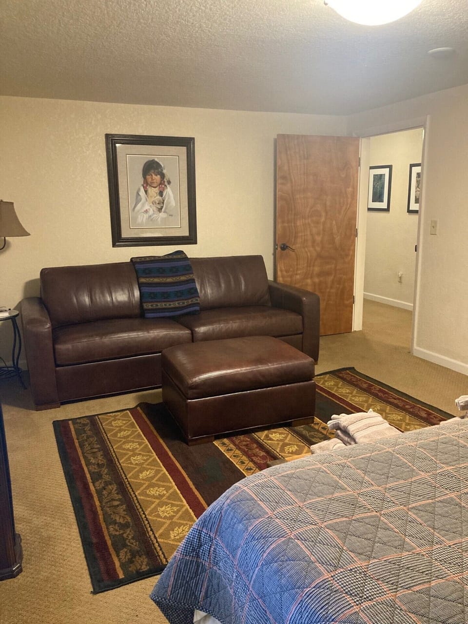 Primary suite with Ethan Allen leather sofa setting area