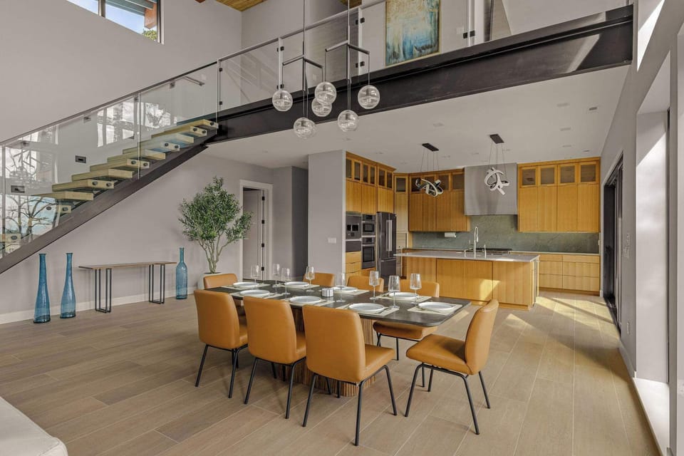 Dining room opening up the modern kitchen. 
