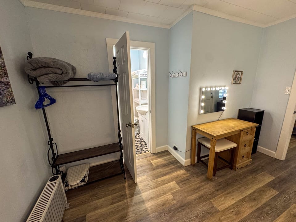 Bedroom storage and decor. A place to comfortably store items, and a place to get ready, or unwind for the night.