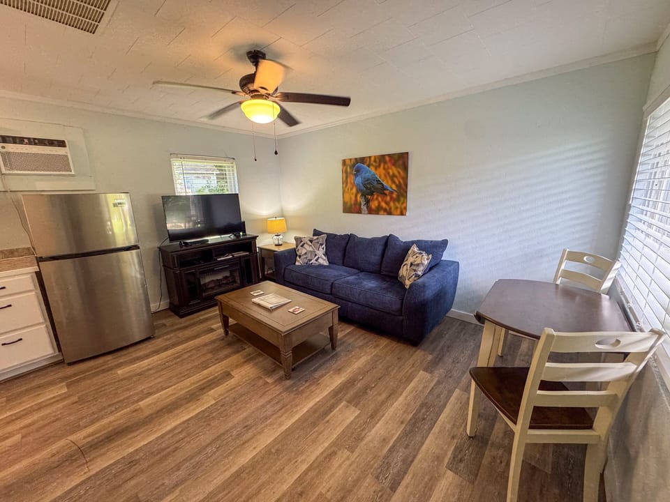 Open living room to sit back and unwind, including a bright and airy dining space.