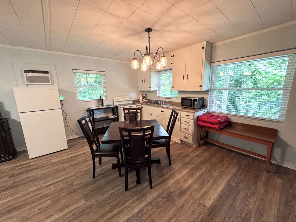 Enjoy seamless entertaining in this airy, open-plan space featuring a gourmet kitchen, modern dining area, and high-end amenities for a comfortable stay.